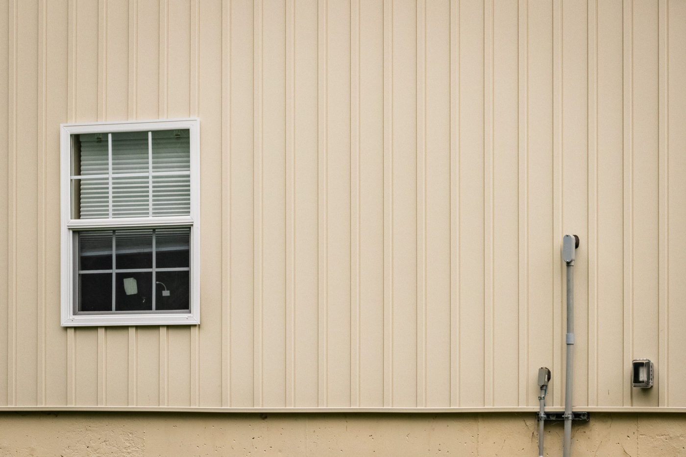 A board and batten garage for sale from Sheds Unlimited