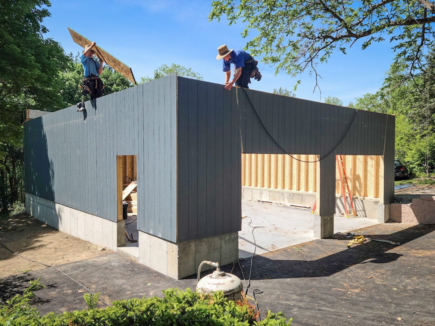 Amish men building a garage in fitchburg