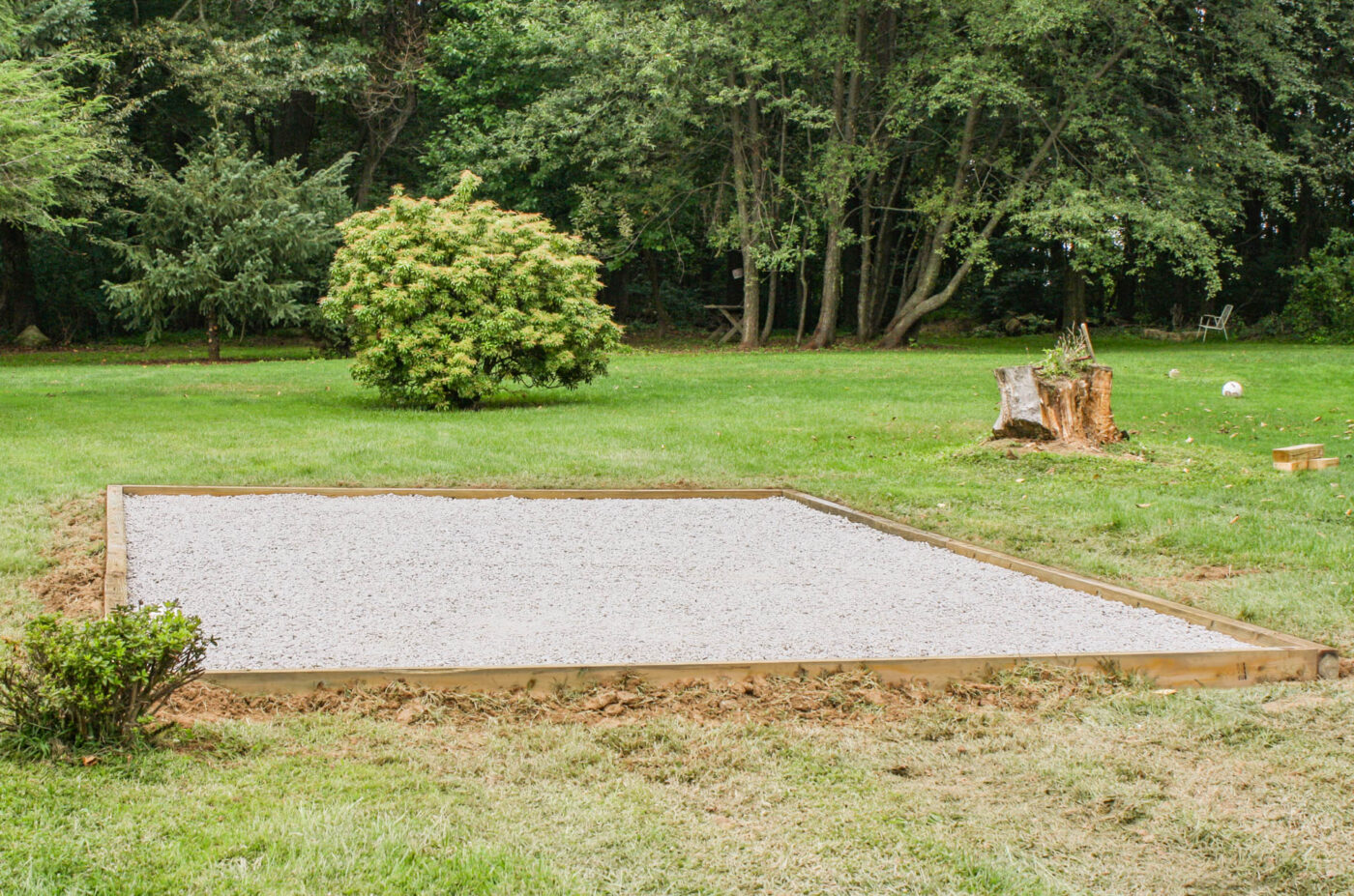 a completed gravel shed pad ready for use