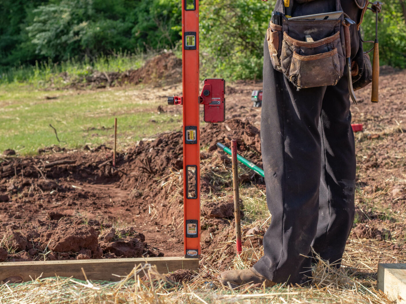 installing a gravel shed pad and using a laser level